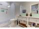 This bathroom features a walk-in shower, a white toilet, and a stand alone vanity at 2972 Lookout Ne Pl, Atlanta, GA 30305