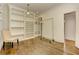 Walk-in closet featuring custom built-in shelving and racks at 2972 Lookout Ne Pl, Atlanta, GA 30305