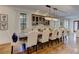 Elegant dining room with hardwood floors, stylish chandelier, and large windows for natural light at 2972 Lookout Ne Pl, Atlanta, GA 30305