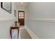 Elegant hallway with gray walls, white trim, and a decorative table at 2972 Lookout Ne Pl, Atlanta, GA 30305