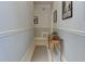 Neutral hallway featuring a stylish console table and decorative wall art at 2972 Lookout Ne Pl, Atlanta, GA 30305