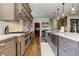Bright kitchen features stainless steel appliances, custom cabinetry and hardwood floors throughout at 2972 Lookout Ne Pl, Atlanta, GA 30305