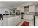 Spacious kitchen with a granite island, stainless steel appliances, and bright, neutral finishes at 2972 Lookout Ne Pl, Atlanta, GA 30305