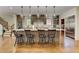 Gourmet kitchen with stainless steel appliances, an island with bar seating and pendant lights at 2972 Lookout Ne Pl, Atlanta, GA 30305
