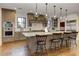 Gourmet kitchen with stainless steel appliances, an island with bar seating and pendant lights at 2972 Lookout Ne Pl, Atlanta, GA 30305