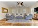 Cozy living room with hardwood floors, plush seating, and plenty of natural light at 2972 Lookout Ne Pl, Atlanta, GA 30305