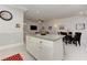 Open living space featuring kitchen island, dining area and living area, with recessed lighting at 2972 Lookout Ne Pl, Atlanta, GA 30305