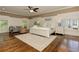 Beautifully lit main bedroom with a king bed and elegant decor at 2972 Lookout Ne Pl, Atlanta, GA 30305