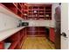 Butler's pantry with custom shelves and cabinetry and wood flooring at 2972 Lookout Ne Pl, Atlanta, GA 30305