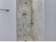Modern walk-in shower with elegant marble tiling, rain shower head, and convenient built-in niche for toiletries at 2972 Lookout Ne Pl, Atlanta, GA 30305