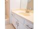 Bathroom with a vanity and framed mirror plus a tiled shower/tub combo at 6203 Crestview Drive Southeast Se Dr, Covington, GA 30014
