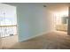 Bedroom with neutral carpet leading to another room and bathroom at 6203 Crestview Drive Southeast Se Dr, Covington, GA 30014