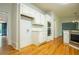 Spacious kitchen featuring stainless steel appliances and ample cabinetry with doorway view of front entry at 6203 Crestview Drive Southeast Se Dr, Covington, GA 30014