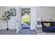 Entryway view with olive tree and open view of the front yard at 672 Quillian Ave, Decatur, GA 30032