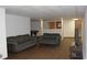 The finished basement is an additional living space with a pool table, furniture, and wood flooring at 6878 Vic Ar Rd, Atlanta, GA 30360