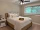 Cozy bedroom with natural light, showcasing comfortable decor and a peaceful ambiance at 6878 Vic Ar Rd, Atlanta, GA 30360