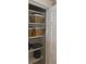 Well-organized closet with shelves and storage baskets for optimal space utilization at 6878 Vic Ar Rd, Atlanta, GA 30360