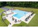 Community pool with seating and lounge areas for relaxing summer days, adding value to the neighborhood at 6878 Vic Ar Rd, Atlanta, GA 30360