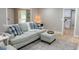View of the living room with wood floors, comfortable seating, and bright natural light at 6878 Vic Ar Rd, Atlanta, GA 30360
