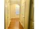 Hallway features hardwood floors, neutral walls, and multiple doors at 1870 Garbrooke, Lawrenceville, GA 30046