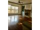 Spacious living room with a cozy fireplace and large windows that let in natural light at 1870 Garbrooke, Lawrenceville, GA 30046