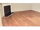 Living room with hardwood floors, fireplace, and ample natural light at 1870 Garbrooke, Lawrenceville, GA 30046