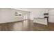 Living room features a kitchen with island at 225 Silver Moon Dr, Loganville, GA 30052