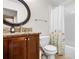 Bathroom featuring tiled floors, vanity, and a shower with a floral-patterned shower curtain at 3650 Ashford Dunwoody Ne Rd # 413, Atlanta, GA 30319