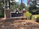 Attractive community sign for The Park at Ashford Condominiums with lush landscaping at 3650 Ashford Dunwoody Ne Rd # 413, Atlanta, GA 30319