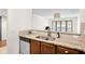 Well-designed kitchen with stainless steel dishwasher and granite countertops at 3650 Ashford Dunwoody Ne Rd # 413, Atlanta, GA 30319