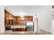 Updated kitchen with stainless steel appliances and a granite countertop at 3650 Ashford Dunwoody Ne Rd # 413, Atlanta, GA 30319