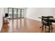 Bright living room with hardwood floors and sliding glass doors to the outside at 3650 Ashford Dunwoody Ne Rd # 413, Atlanta, GA 30319