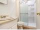 Bathroom with shower stall, toilet, and vanity at 1077 Mainstreet Valley Dr, Stone Mountain, GA 30088