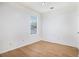Bedroom with hardwood flooring and natural light at 1077 Mainstreet Valley Dr, Stone Mountain, GA 30088