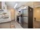 Modern kitchen featuring stainless steel appliances and granite countertops at 1077 Mainstreet Valley Dr, Stone Mountain, GA 30088