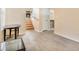 Inviting living room featuring hardwood floors, stairs, and cozy fireplace for a comfortable home atmosphere at 1077 Mainstreet Valley Dr, Stone Mountain, GA 30088