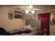Cozy bedroom featuring a comfortable bed and decorative mirrors at 20 Bacchus Dr, Lawrenceville, GA 30045