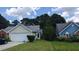 Lovely home featuring a two-car garage, and a spacious front yard at 20 Bacchus Dr, Lawrenceville, GA 30045