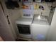 View of laundry room with a modern washer and dryer set at 20 Bacchus Dr, Lawrenceville, GA 30045