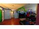 Spacious living room features unique colorful walls, a TV, and a fireplace at 20 Bacchus Dr, Lawrenceville, GA 30045