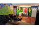 Bright living room features unique wall art, a leather sofa, and modern furnishings at 20 Bacchus Dr, Lawrenceville, GA 30045