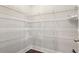 Pantry with white wire shelving, offering ample storage space for food and kitchen essentials at 253 Orchard Trl, Holly Springs, GA 30115