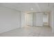 Clean, unfinished basement with white walls, tile flooring, and good potential for customization at 263 Mountainview Cir, Canton, GA 30115