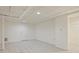 Bright, unfinished basement with tile floor, white walls, and good ceiling height offering versatile space at 263 Mountainview Cir, Canton, GA 30115