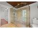 Bright bathroom features a spacious glass shower, tile floors, and a modern toilet at 263 Mountainview Cir, Canton, GA 30115