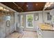 Bathroom boasts a double vanity, granite countertops, a large shower with beautiful tiling, and a bright window at 263 Mountainview Cir, Canton, GA 30115