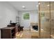 Bathroom boasts a granite shower, a vessel sink, and tiled floors at 263 Mountainview Cir, Canton, GA 30115