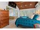 Bright primary bedroom with an ensuite bathroom, a wood ceiling, and ample natural light at 263 Mountainview Cir, Canton, GA 30115