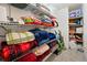 Linen closet with wire shelving and several neatly folded blankets, pillows, and linens at 263 Mountainview Cir, Canton, GA 30115