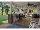 Spacious outdoor area featuring a covered patio with a bar and seating, great for gatherings at 263 Mountainview Cir, Canton, GA 30115